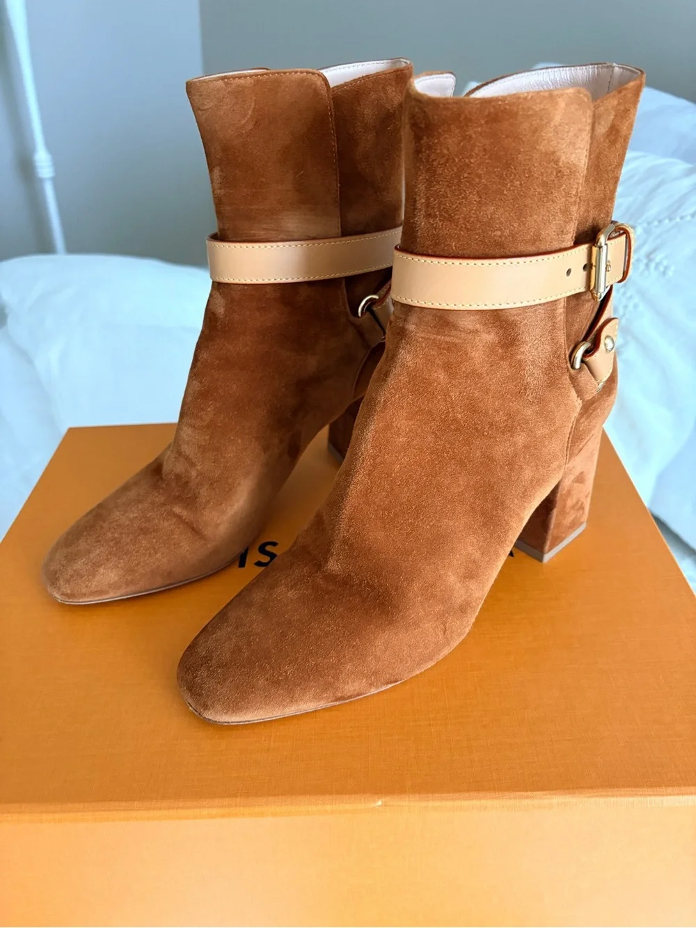 Louis Vuitton Women's Suede Ankle Boots in Chestnut with Leather Strap Detail.